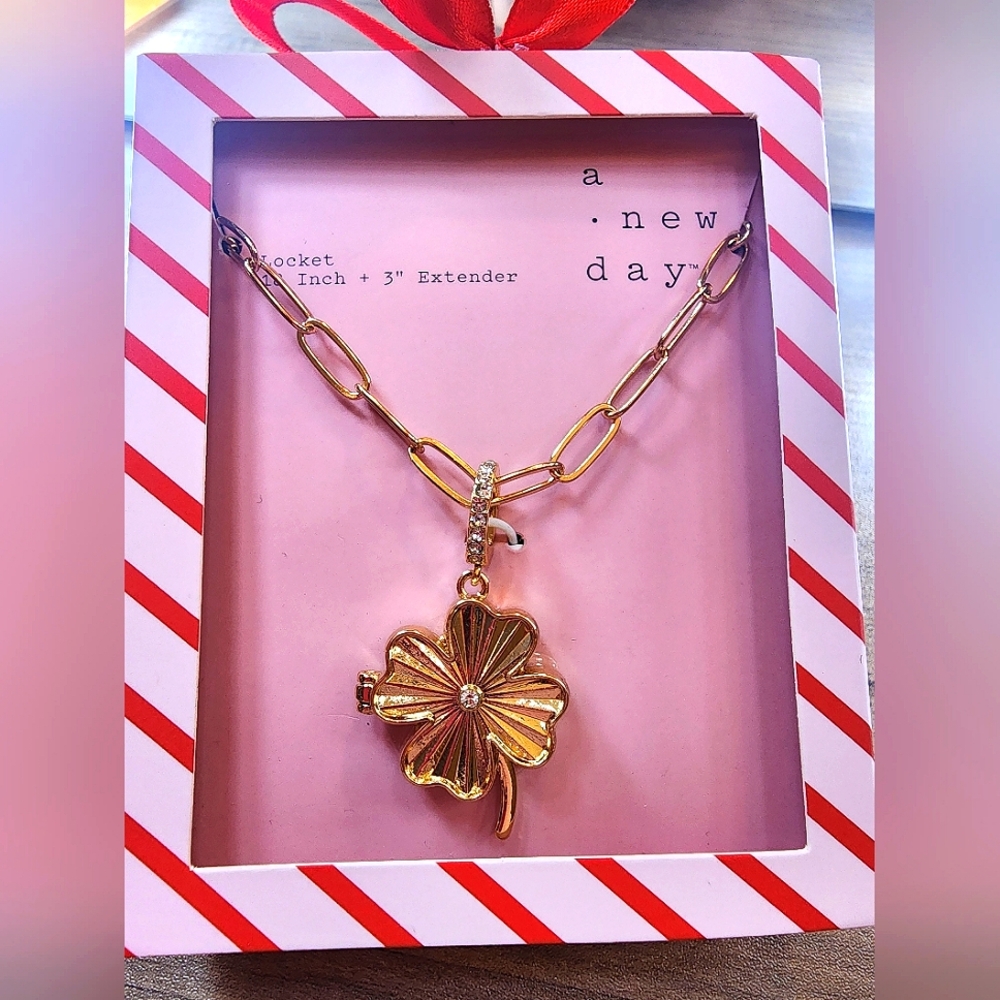 A New Day Gold Clover Locket Charm Necklace. **BRAND NEW IN BOX**